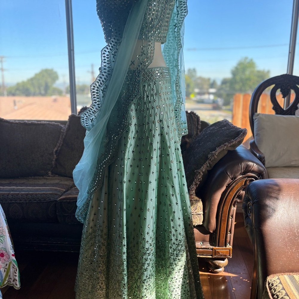 *BRAND NEW* Mint green heavy Lehenga with REAL Mirror work on Raw Silk.